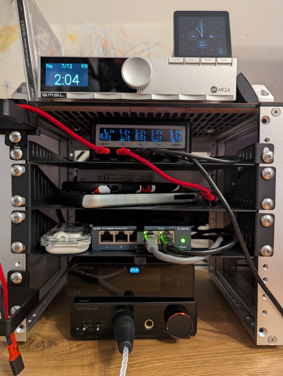 DeskPi RackMate T0 on the desk DeskPi RackMate T0 on the desk