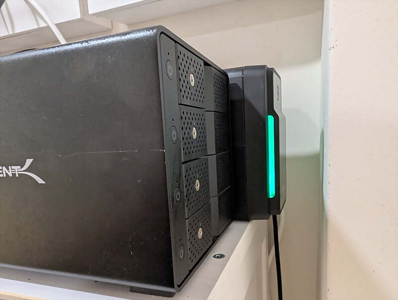 UPS on the shelf next to the rack UPS on the shelf next to the rack